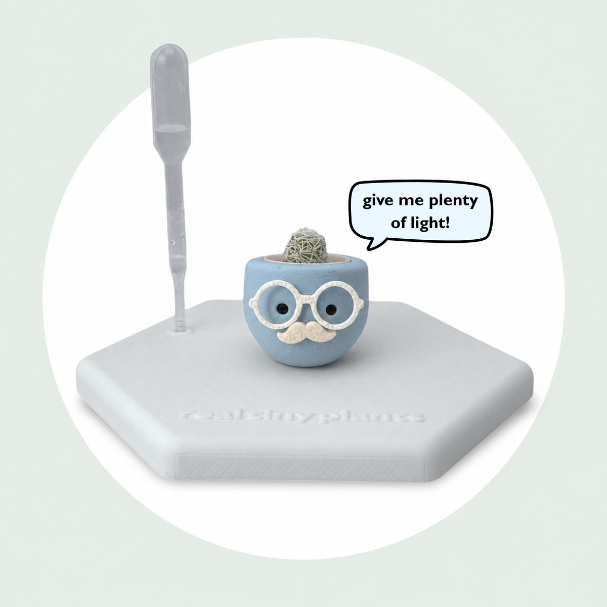 Chilly Chap on its magnetic coaster with a speech bubble that says give me plenty of light